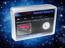 Listing image for Peekskill Fragment In Display Box - The Car Hitter! Famous Meteorite from the US